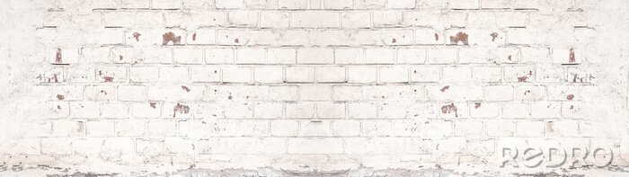 Behang Bekraste bakstenen muur