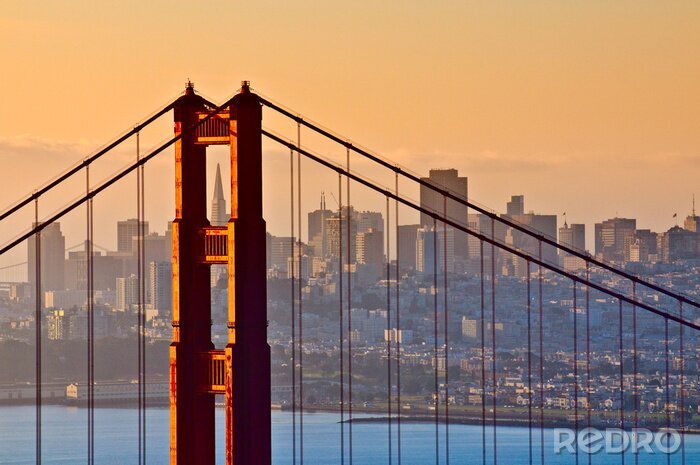 Behang Golden gate bridge en zonsondergang