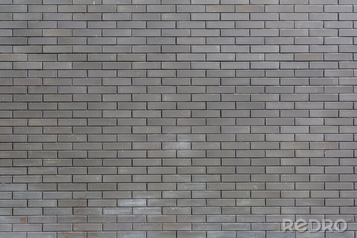 Behang Grey brick wall..