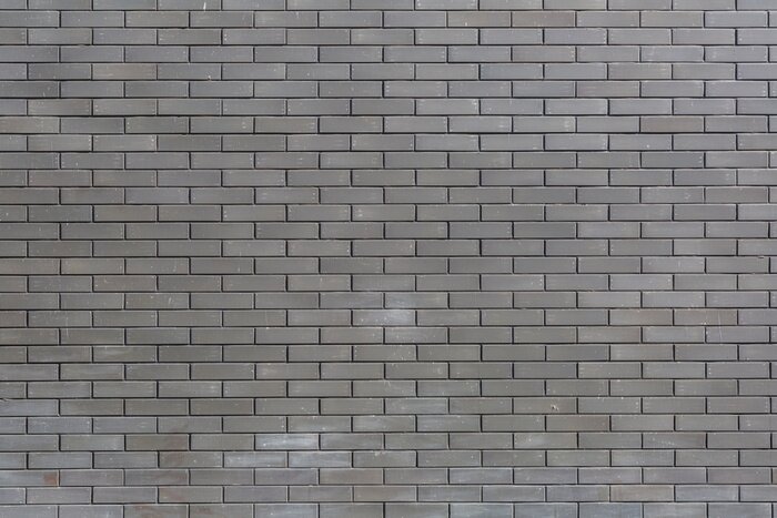 Behang Grey brick wall..