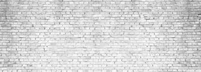 Grijze bakstenen geplaatst in een muur