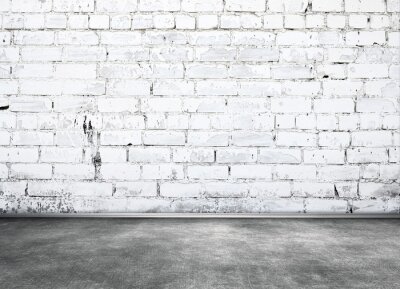 Witte muur met oude bakstenen