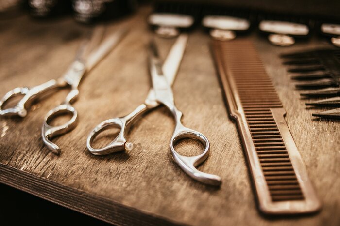 Canvas Accessories for haircuts are on the shelf in the salon