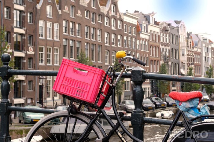Canvas Amsterdam en een fiets met mandje