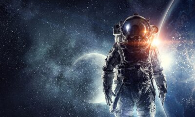 Astronaut op de achtergrond van de ruimte met planeten