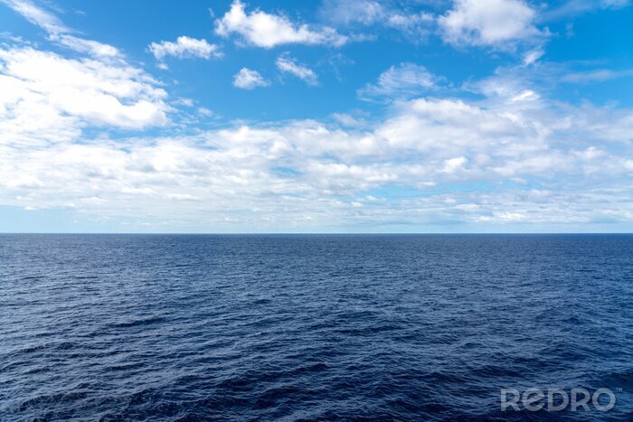 Canvas Atlantic Ocean Seascape with blue ocean and a sky filled with clouds 