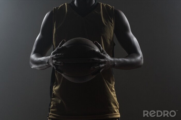 Canvas basketballer op een donkere achtergrond