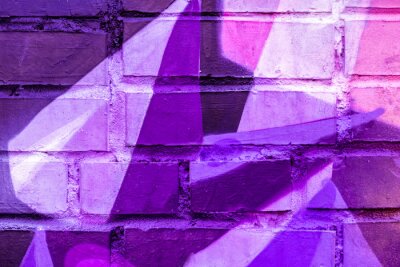 Canvas Beautiful bright colorful street art graffiti background. Abstract creative spray drawing fashion colors on the walls of the city. Urban Culture, black ,blue, purple , violet , neon texture