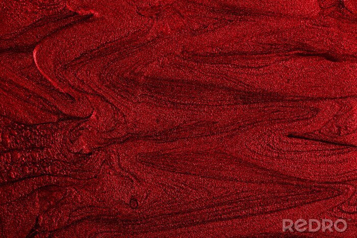 Canvas Beautiful stains of liquid nail polish,fluid art technique.Bright red marble background.Liquid stripy paint texture.Nail laquer flow modern backdrop.Minimalistic concept.Copy space for design.