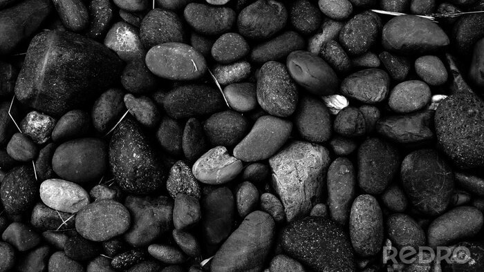 Canvas black stone background, pebble beach stone floor