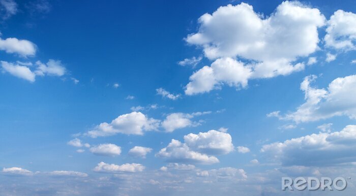 Canvas Blue sky with white clouds. Blue sky background with clouds.
