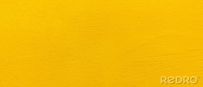 Canvas Blurred Yellow stucco wall background. Yellow painted cement wall texture.