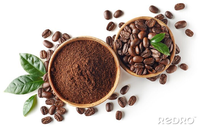 Canvas Bowl of ground coffee and beans isolated on white background