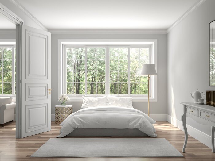 Canvas Classical bedroom and living room 3d render,The rooms have wooden floors and gray walls ,decorate with white and gold furniture,There are large window looking out to the nature view.