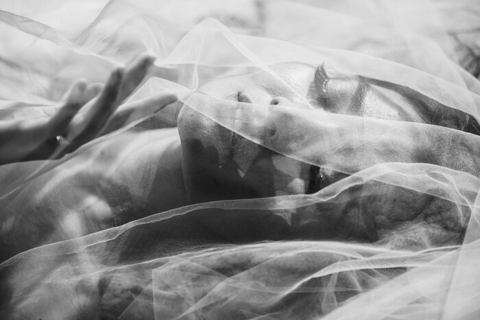 Canvas Closeup Sexy Erotic Woman Face under see through fabric with monontone art photography.