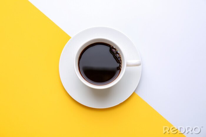 Canvas Cup of hot coffee on color background