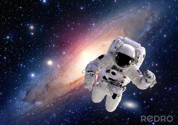 Canvas Een astronaut vliegt door de ruimte tegen een achtergrond van sterren