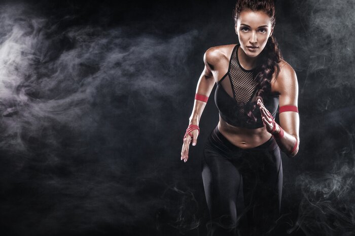 Canvas Een atletische vrouw die rent