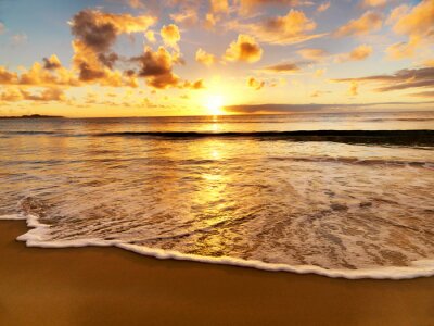 Canvas Een romantische zonsondergang op het strand