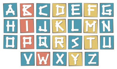 Een set letters op gekleurd karton