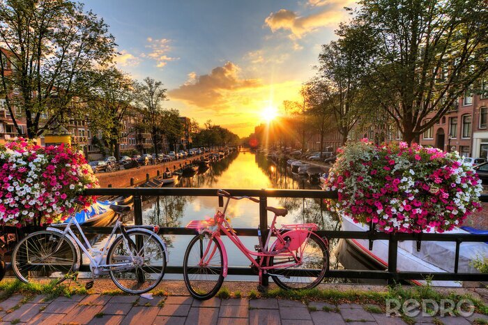 Canvas Fahrräder in Amsterdam bei Sonnenuntergang