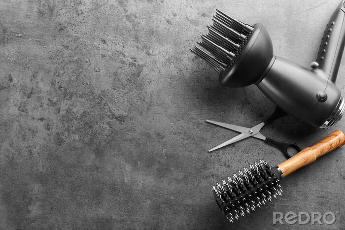 Canvas Flat lay composition with set of hairdresser's tools on grey background