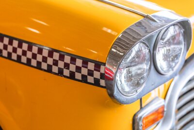 Canvas gele taxi auto close-up koplicht voor taxichauffeur achtergrond concept