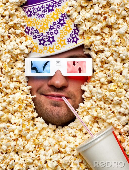 Canvas Gezicht in popcorn kijken naar 3D film