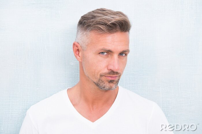 Canvas Grizzle hair suits him. Deal with gray roots. Man attractive well groomed facial hair. Barber shop concept. Barber and hairdresser. Man mature good looking model. Silver hair shampoo. Anti ageing