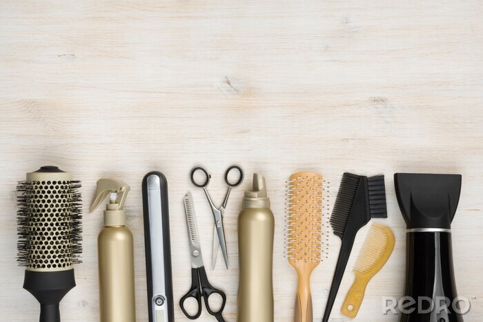Canvas Hairdressing tools on wooden background with copy space at top
