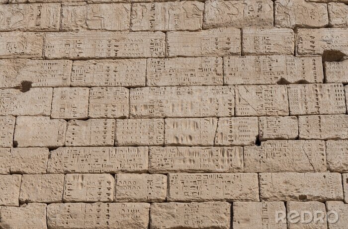Canvas Hieroglyphic carvings on an ancient egyptian temple wall