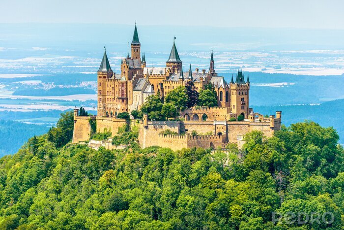 Canvas Hohenzollern Castle on mountain top, Germany. This castle is a famous landmark in vicinity of Stuttgart. Scenic view of Burg Hohenzollern in summer. Landscape of Swabian Alps with Gothic castle.