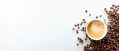 Canvas hot espresso and coffee bean on white table with soft-focus and over light in the background. top view