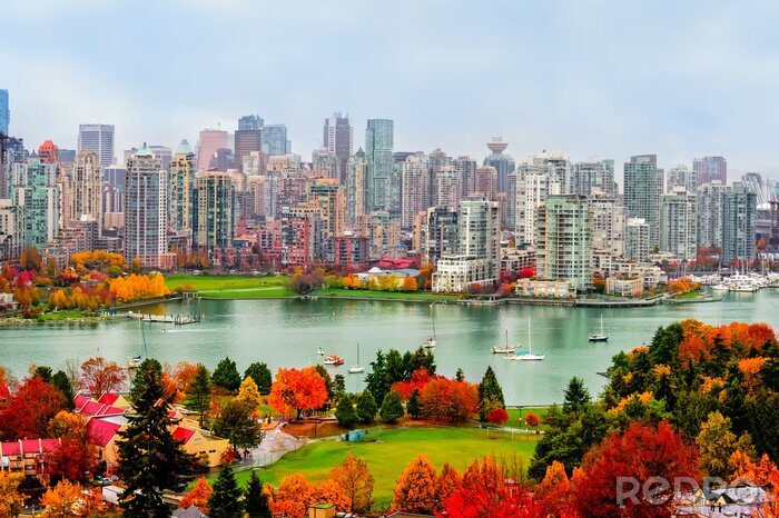 Canvas kleurrijk de herfstlandschap van een moderne stad door de rivier