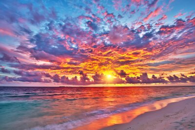 Canvas Kleurrijke zonsondergang over de oceaan op de Malediven