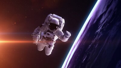 Canvas Kosmonaut op de achtergrond van de planeet aarde