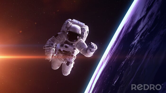 Canvas Kosmonaut op de achtergrond van de planeet aarde