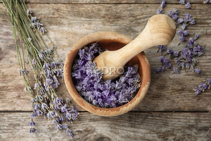 Canvas Mortar with lavender flowers on table, top view. Ingredient for natural cosmetic