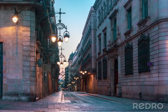 Canvas Narrow cobbled medieval empty street with beautiful street lights in Barri Gothic Quarter in the morning, Barcelona, Catalonia, Spain