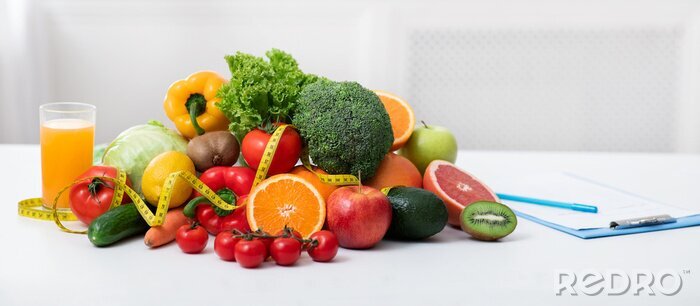 Canvas Nutritionist's workplace with fruits, vegetables, measuring tape on table