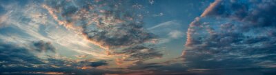 Canvas Panorama evening sky with blue, white and orange clouds