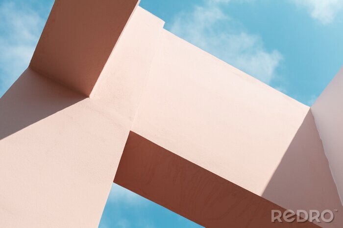 Canvas Pink facade structures under blue sky