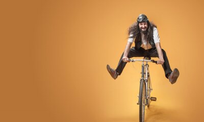 Canvas Portrait of a skinny nerd riding a bike