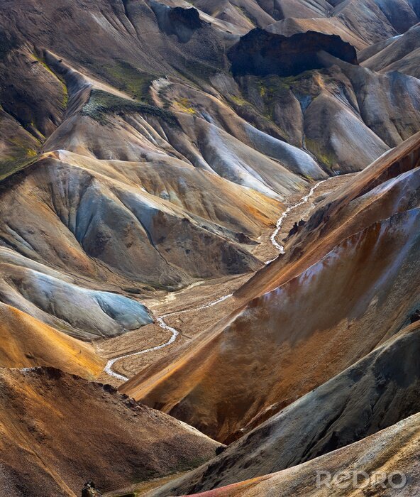 Canvas River along a Valley in Landmannalaugar among colorful mountains, Iceland