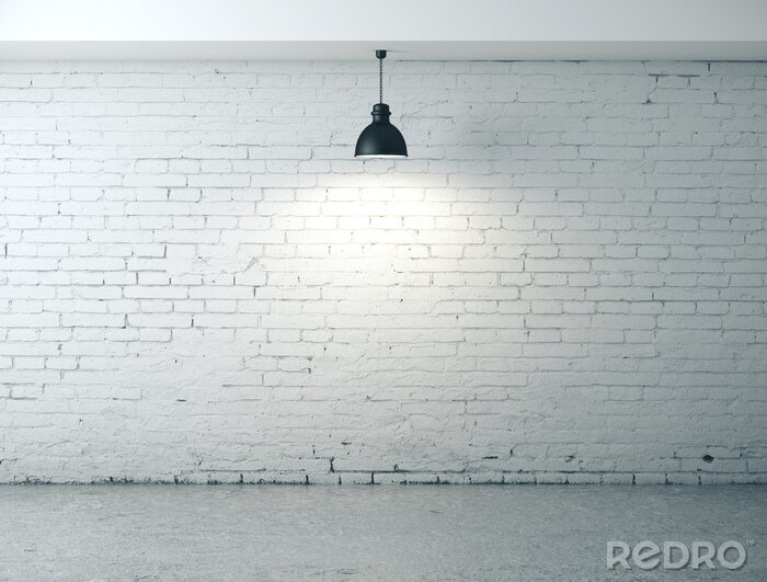 Canvas room with blank wall, lamp and concrete floor