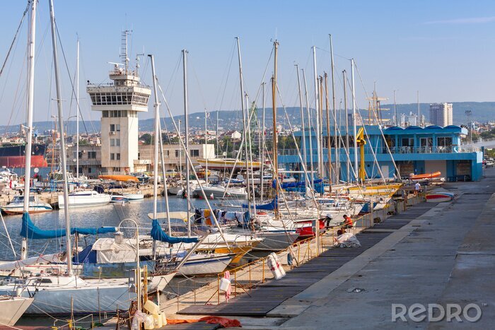 Canvas Sailing yachts and pleasure boats stand in port of Varna
