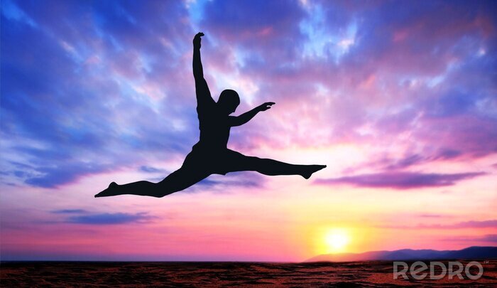 Canvas Silhouet van een springende atleet
