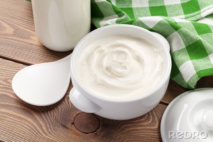 Canvas Sour cream in a bowl and milk bottle