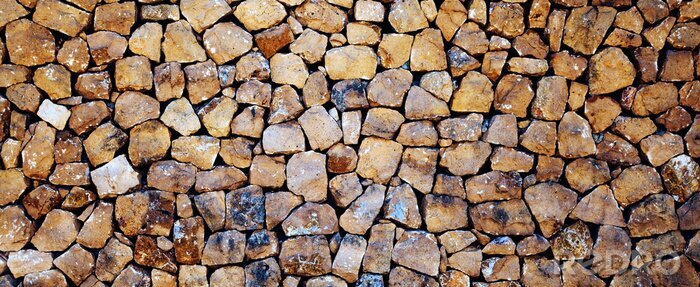 Canvas Stones, rocks and boulders - as a stone wall background texture / abstract design.