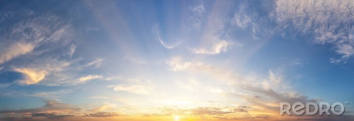 Canvas Sunset cloudy sky with the orange sun
